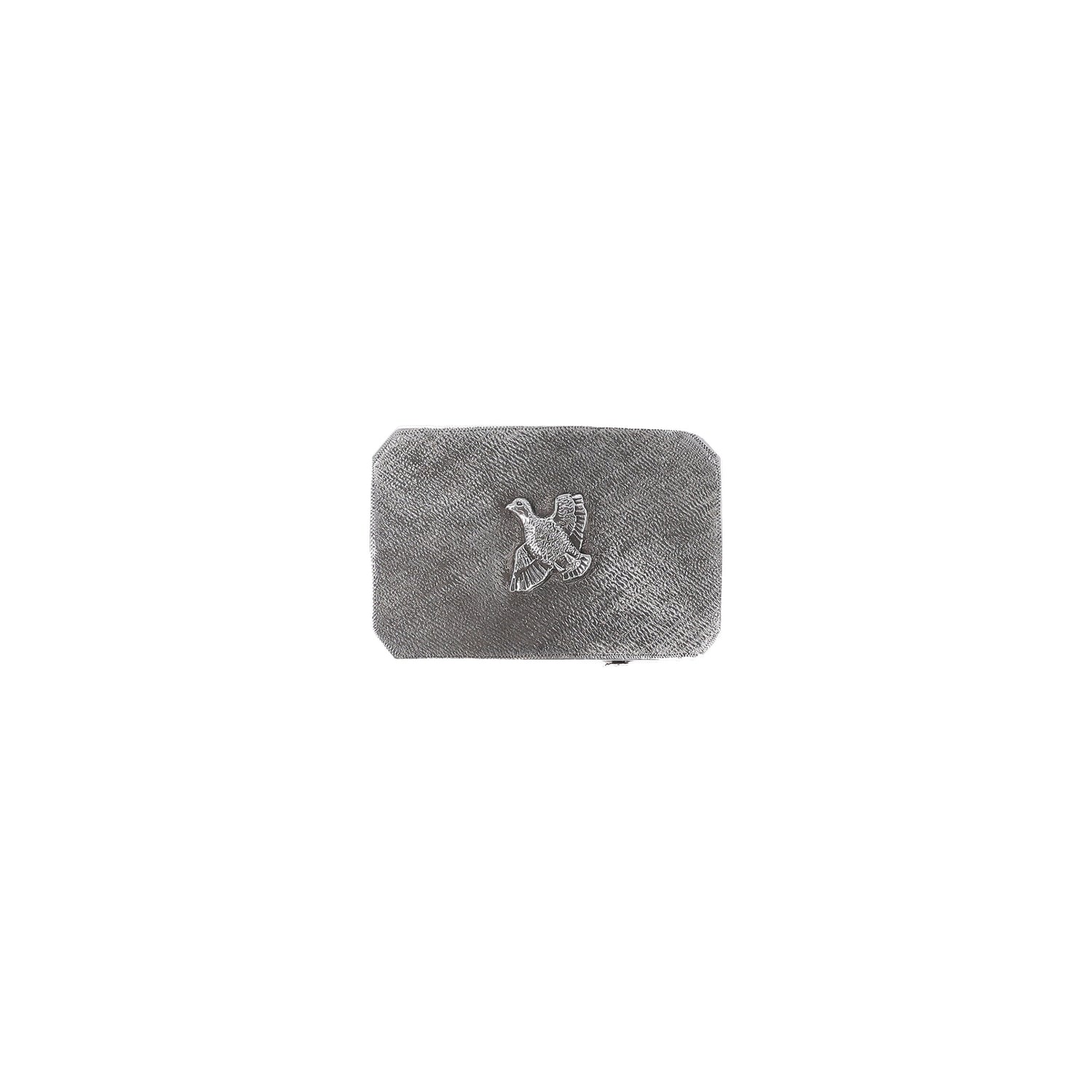Tom Beckbe Crosshatch Quail Belt Buckle in sterling silver features a raised quail design on a plain background.