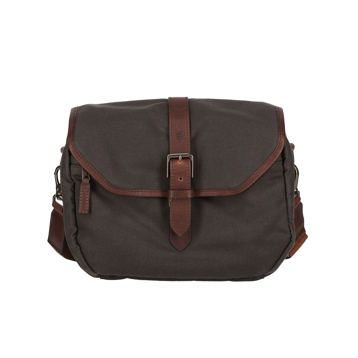 The Tom Beckbe Canvas Blind Bag is a dark green messenger bag with a leather strap, buckle details, and flap closure.