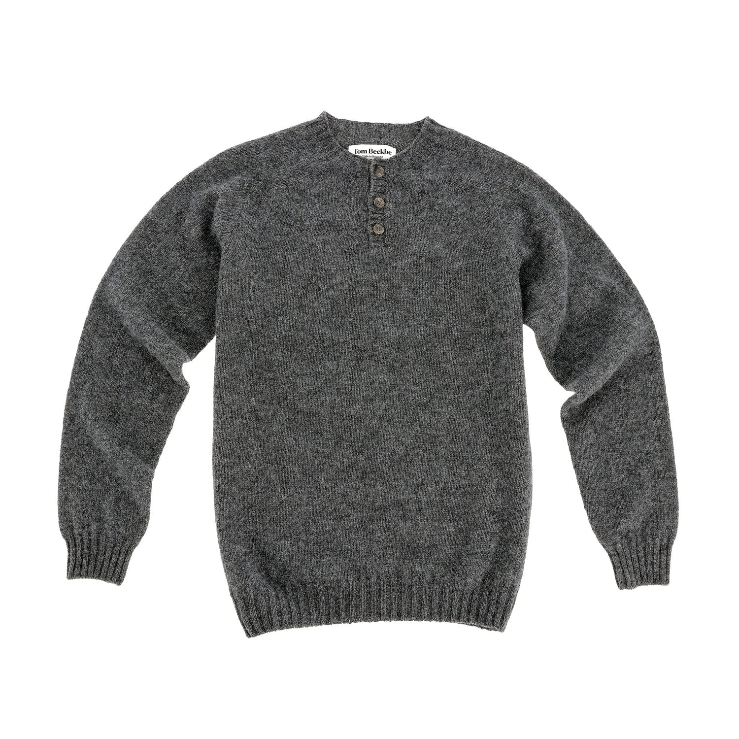 The Tom Beckbe Albemarle Henley Sweater in Basalt, shown flat with three buttons, made in Scotland.