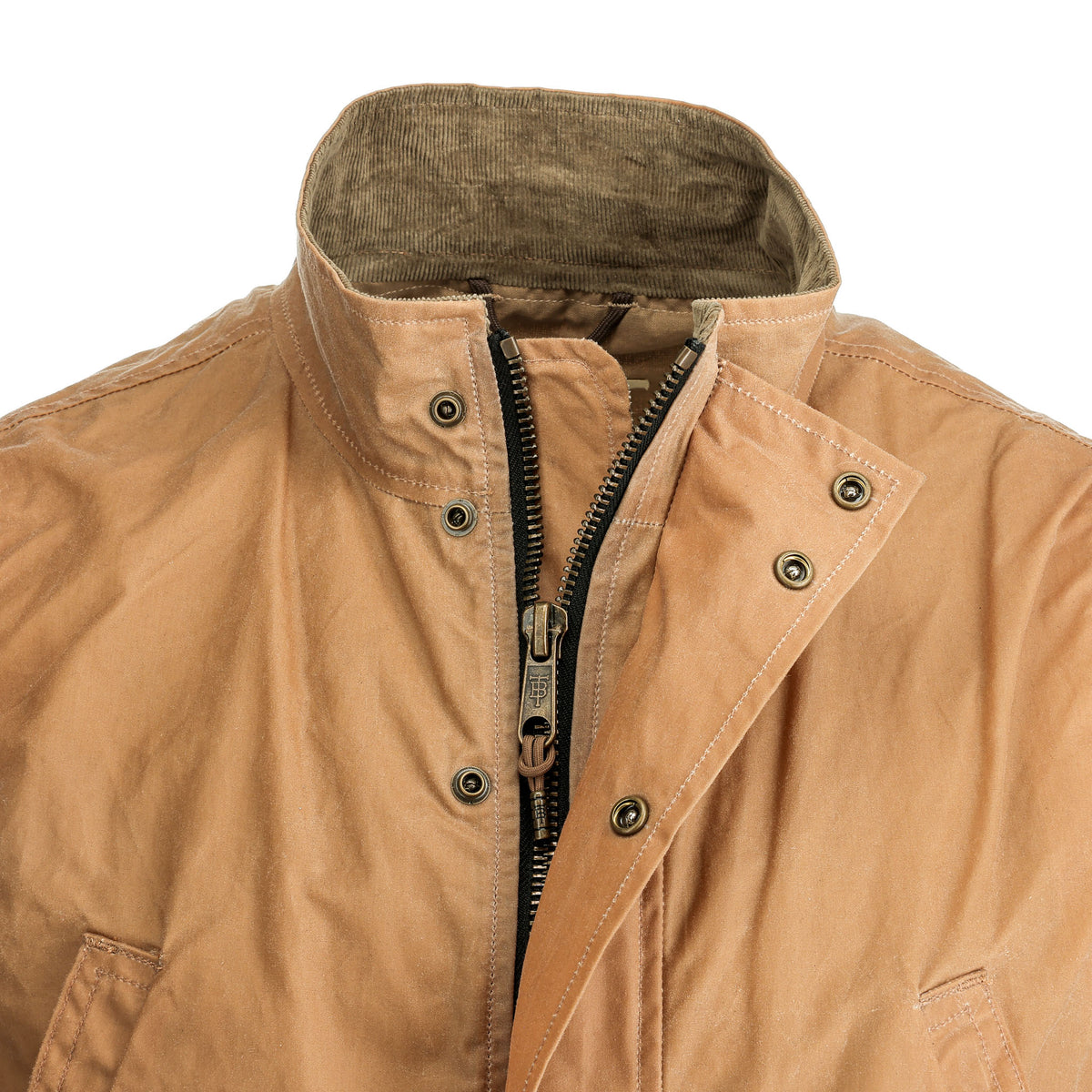 Tom Beckbe Kinsman Vest in tan: stand-up collar, weatherproof, front zipper & snaps, two pockets; shoulder view shown.