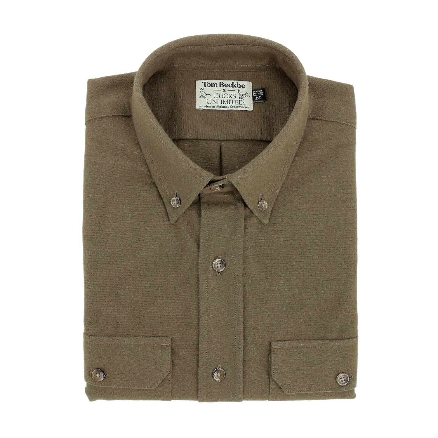 A folded Tom Beckbe Hartwell Moleskin Shirt in Olive, a men’s long-sleeve outdoor shirt with two chest pockets.