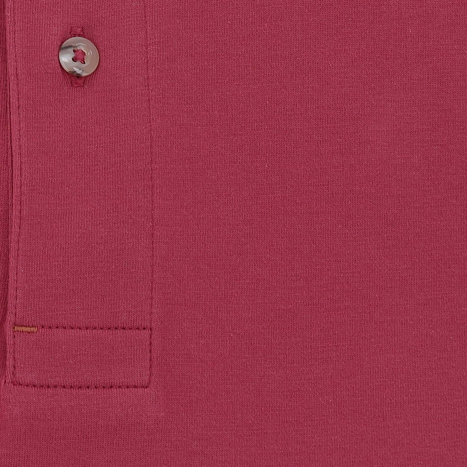 Close-up of the Tom Beckbe Benton Polo Shirt, classic fit, showing button, buttonhole, and detailed stitching.