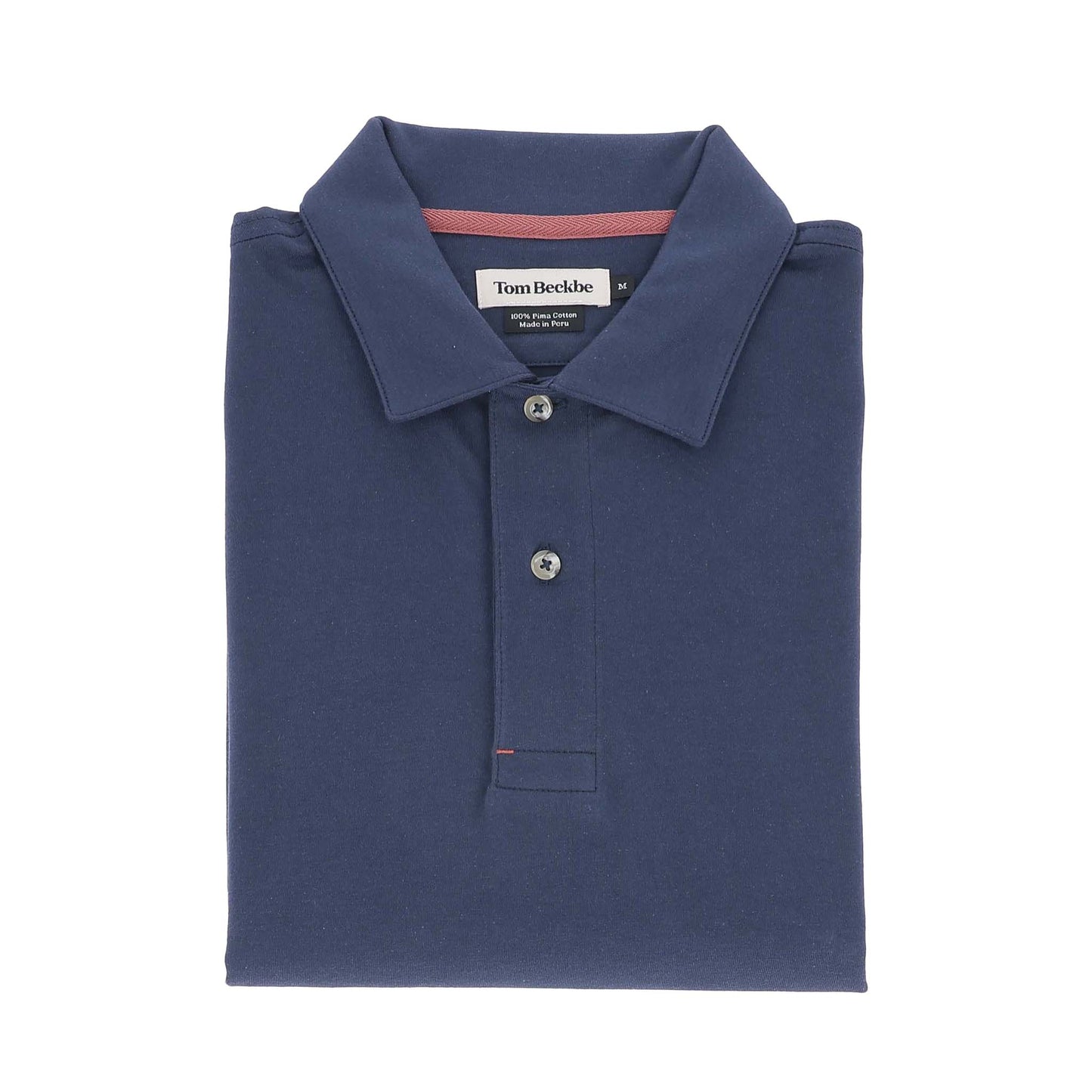 A folded navy blue Benton Polo Shirt by Tom Beckbe with classic fit, collar, and three buttons.