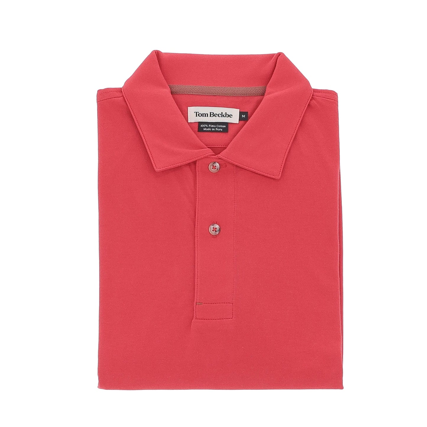 A neatly folded red Benton Polo Shirt with a collar and three buttons, labeled "Tom Beckbe" on the inside tag.