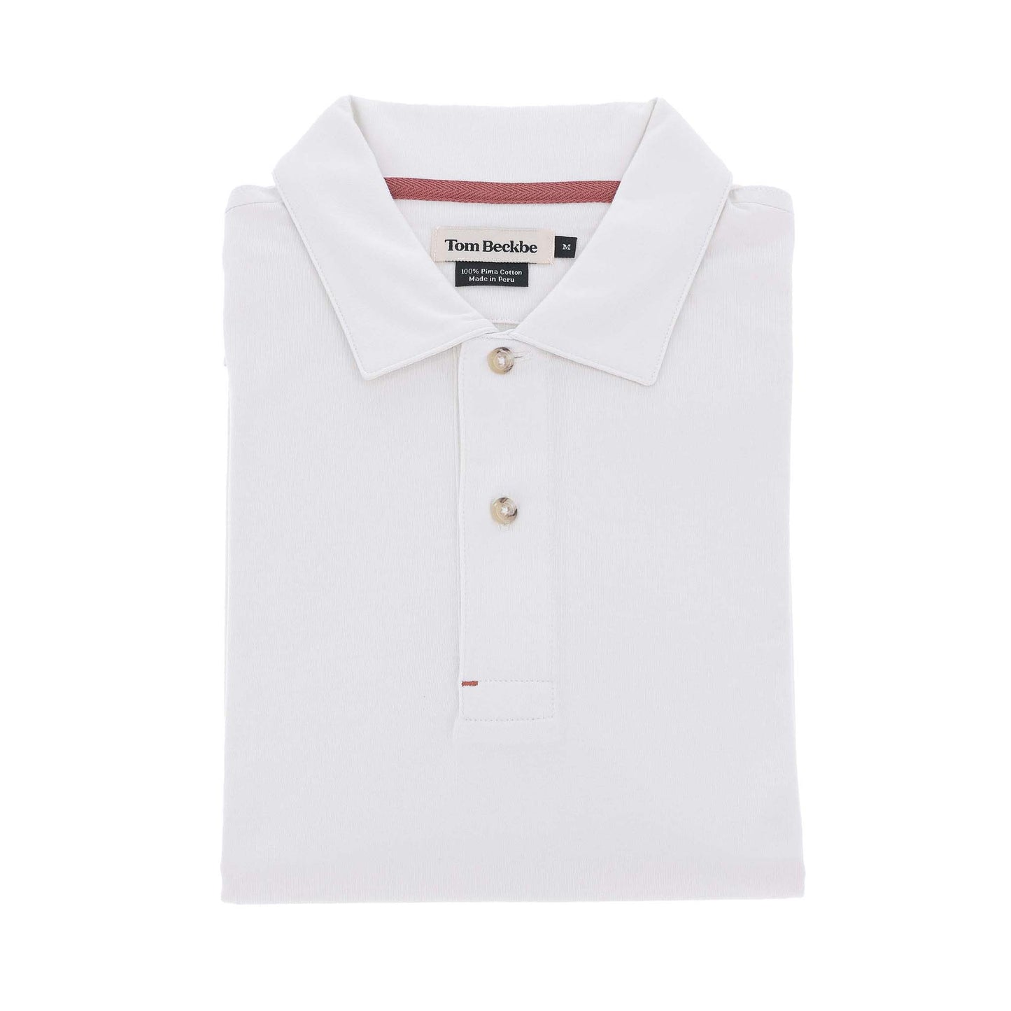 The Tom Beckbe Benton Polo Shirt is a classic fit white men's polo with a collar, button placket, and label inside.