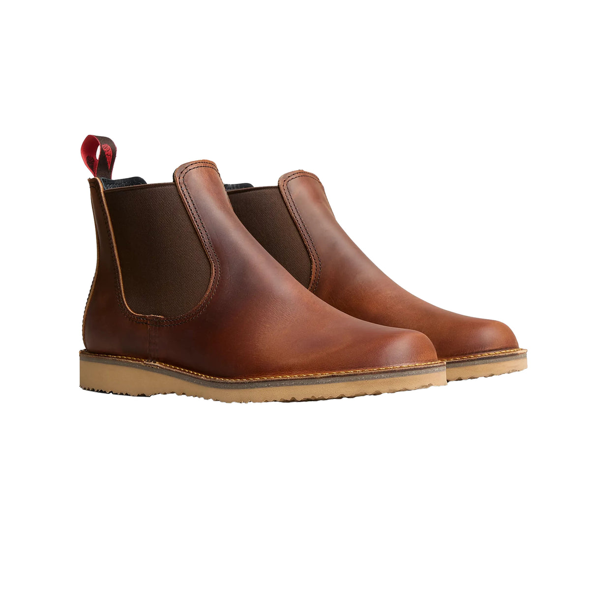 Tom Beckbe’s Red Wing Weekender Chelsea Boot in copper leather features quality craftsmanship and a tan rubber sole.