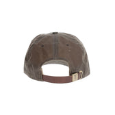 Back view of Tom Beckbes Waxed Cotton 6-Panel Baseball Hat with adjustable strap and metal buckle.