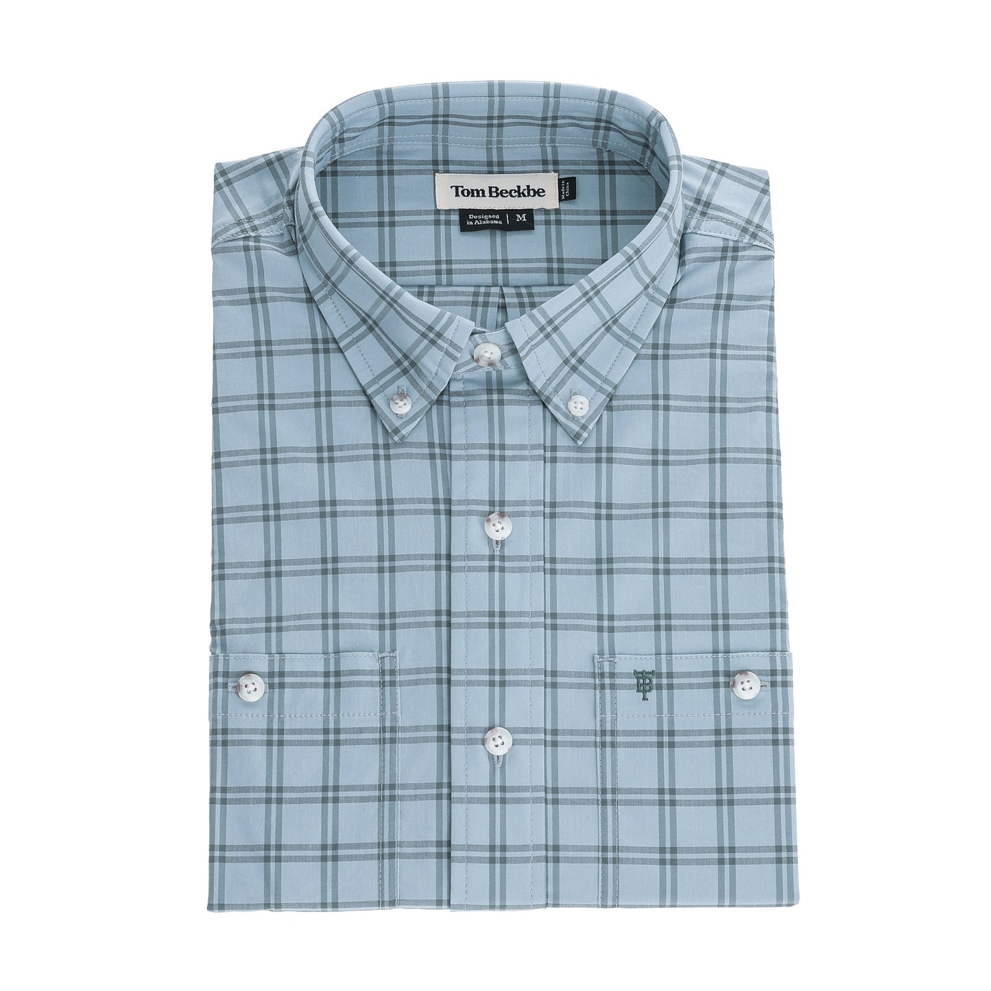 The Tom Beckbe Tidewater Shirt is a light blue, UPF 30+ long sleeve fishing shirt with white buttons and a front pocket.