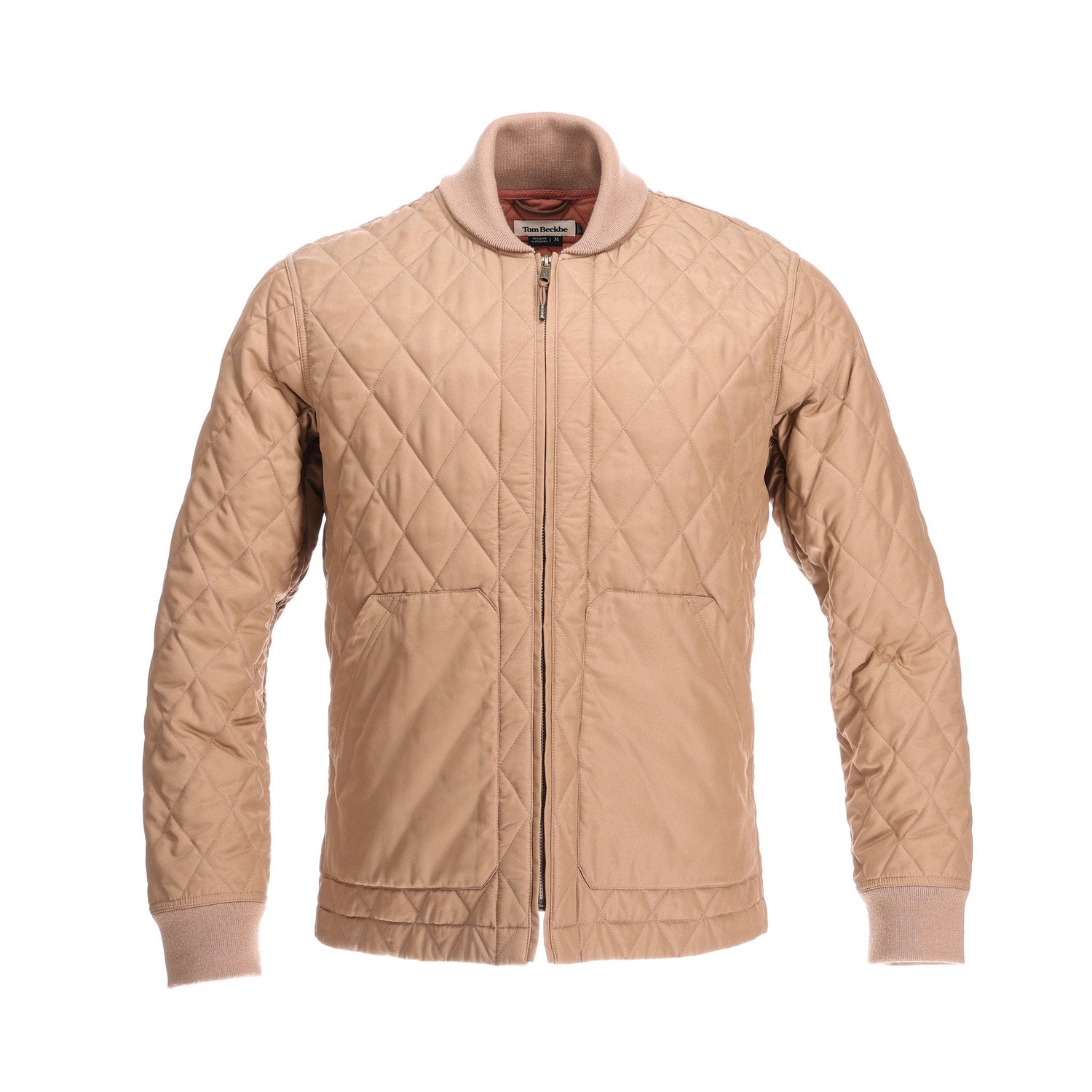 The Tom Beckbe Logan Bomber Jacket boasts vintage style, beige quilting, ribbed cuffs, a front zipper, and a smart collar.