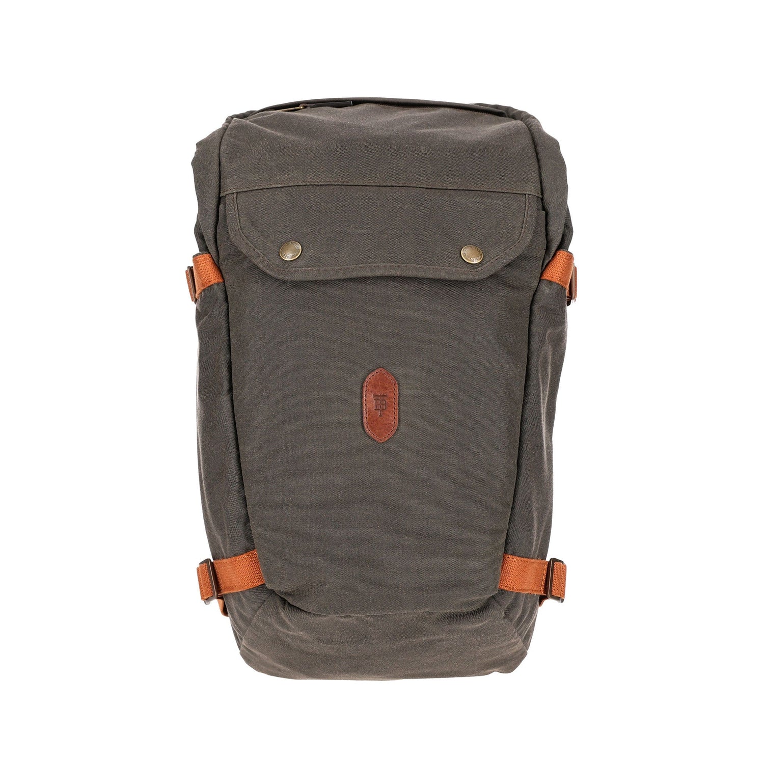 Tom Beckbes dark green Canvas Daypack features brown leather accents, adjustable straps, and a metal-button top flap.