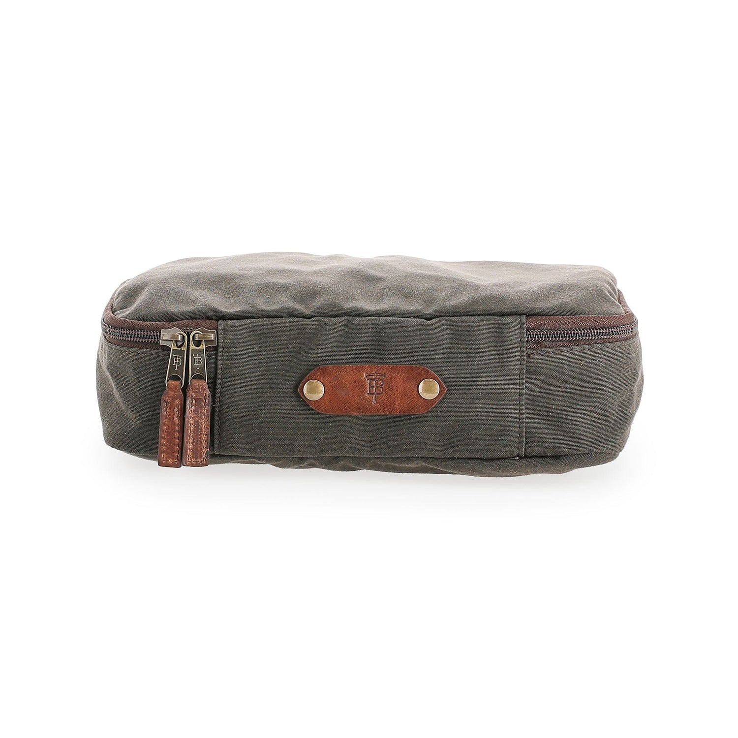 Tom Beckbe Canvas Packing Cube with brown leather accent and dual zippers on a white background.
