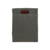 Tom Beckbe Canvas Portfolio: Gray sleeve with pocket & brown leather accent for versatile organization, on white.