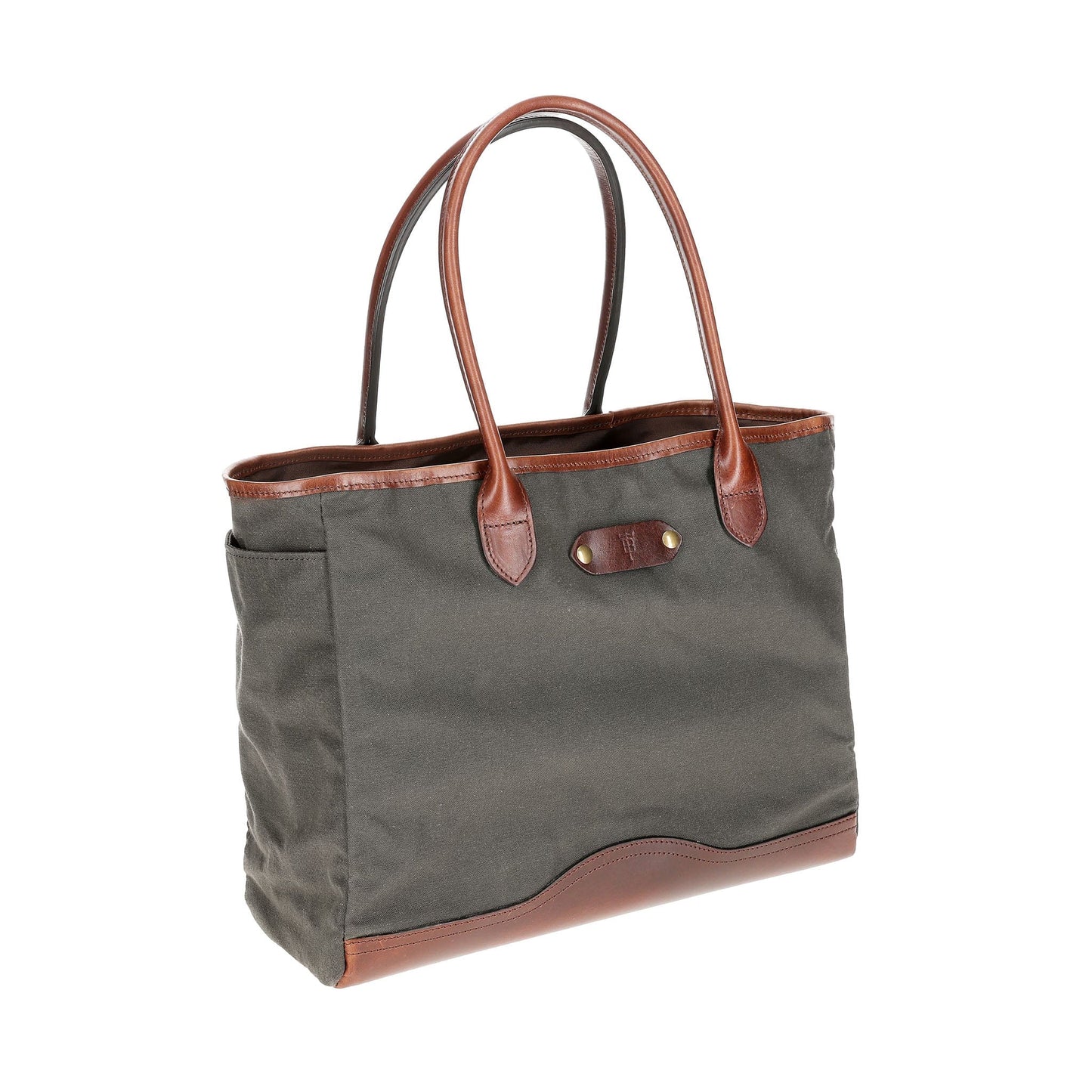 The Tom Beckbe Canvas Tote is durable, featuring green canvas, brown leather handles, a front pocket, and a reinforced bottom.