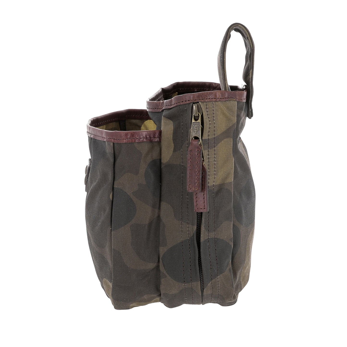 The Tom Beckbe Classic Camo Shell Bag features waxed canvas, zipper, loop handle, and compartments for shotgun shells.