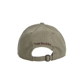 Back view of the Cotton Twill 5-Panel Hat - Pintail in olive with Tom Beckbe logo above the adjustable strap.
