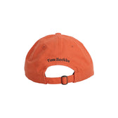 Tom Beckbe Cotton Twill 6-Panel Hat - English Setter, shown from the back with logo above adjustable metal-buckle strap.