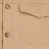 Close-up of the Tom Beckbe Crawford Jacket in beige with a pocket, visible stitching, and metal buttons.