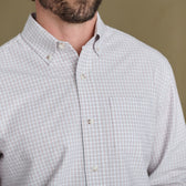 A man wears the Tom Beckbe Culver Oxford Shirt in breathable grid-pattern oxford, shown chest to chin.