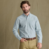Man with brown hair and beard wears the Tom Beckbe Culver Oxford Shirt, standing against a plain background.