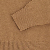 Close-up of the Henry Shawl Sweater in Royal Alpaca by Tom Beckbe, featuring a ribbed cuff and textured knit.