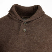 Close-up of Tom Beckbe’s Henry Shawl Sweater in Royal Alpaca, featuring a brown knit and two stylish neck buttons.