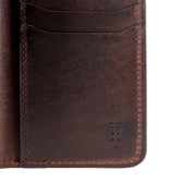 Close-up of the Tom Beckbe Leather Billfold featuring two card slots and embossed TB initials in the corner.