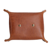 Tom Beckbe Leather Change Tray—rectangular, raised corners, US leather, metal rivets, top view.