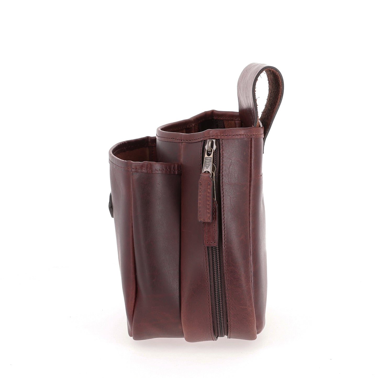 The Tom Beckbe Leather Shell Bag features multiple compartments and a zipper, shown upright on a white background.