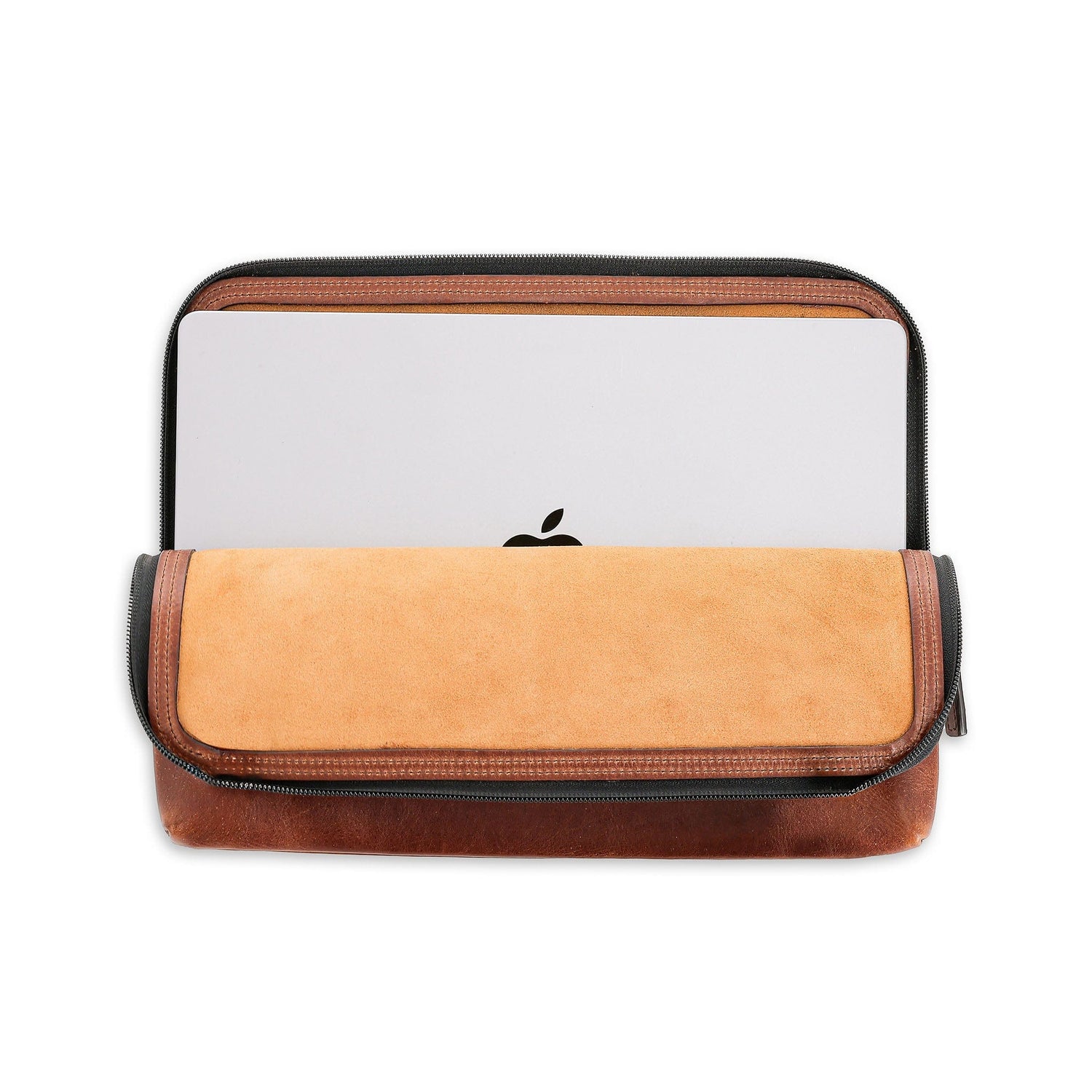 Laptop secure in Tom Beckbes Leather Travel Pouch with antique brass zipper, showing the Apple logo.