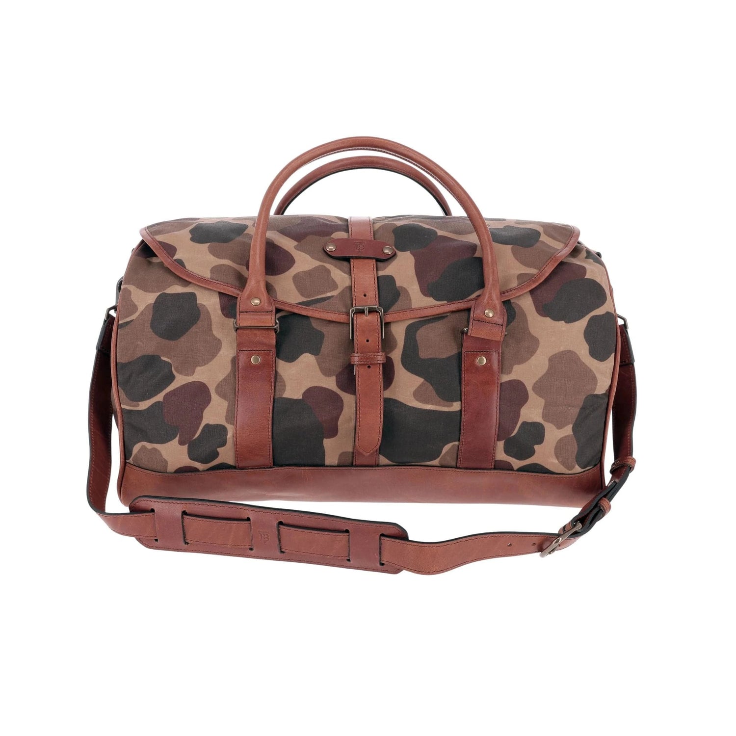 The Tom Beckbe Classic Camo Weekender Duffel Bag features brown leather straps, handles, and a detachable shoulder strap.