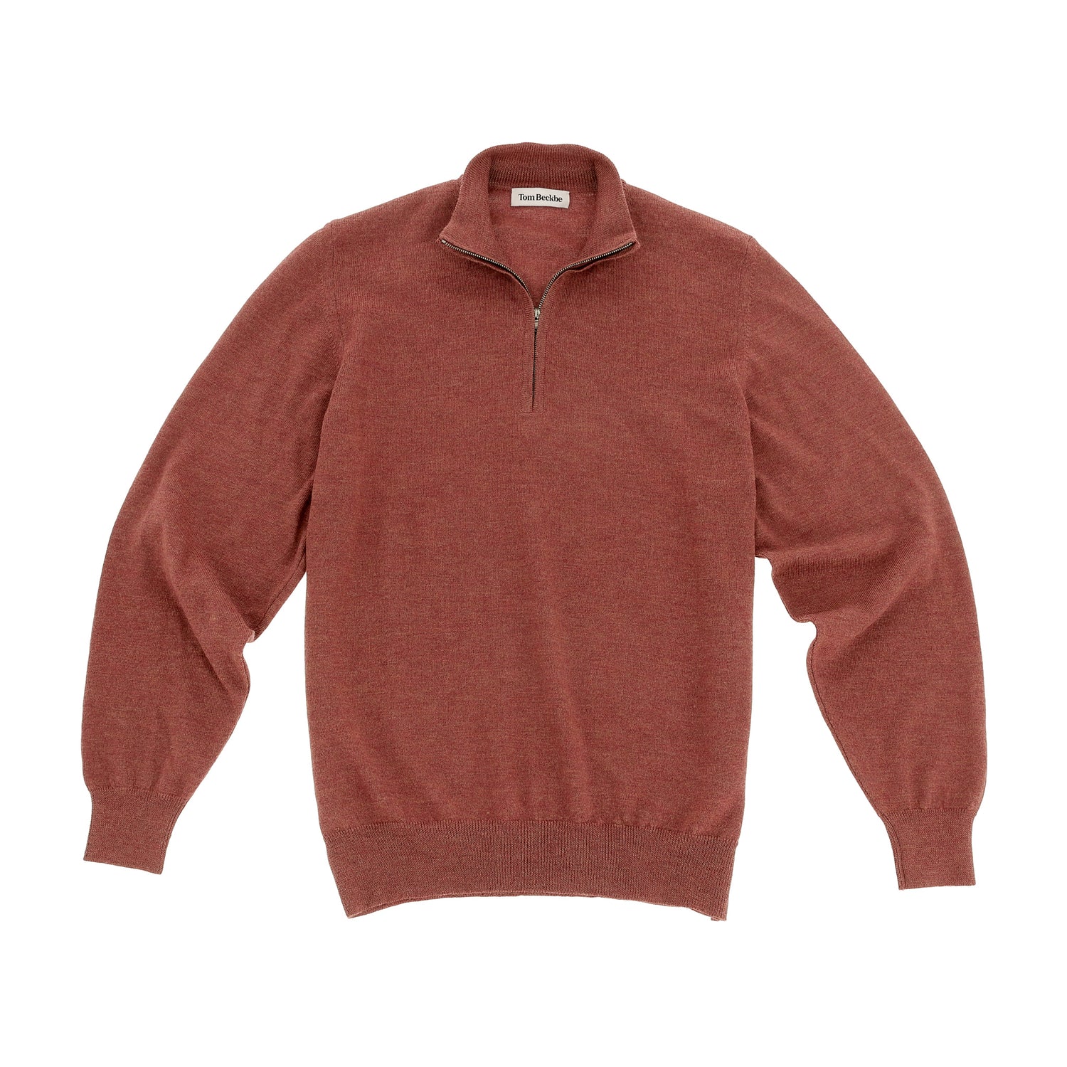 The Tom Beckbe York Merino Quarter Zip, rust-colored with ribbed cuffs and hem, shown flat on a white background.
