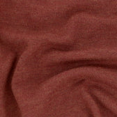 Close-up of the Tom Beckbe York Merino Quarter Zip sweater, showcasing its reddish-brown color and soft texture.