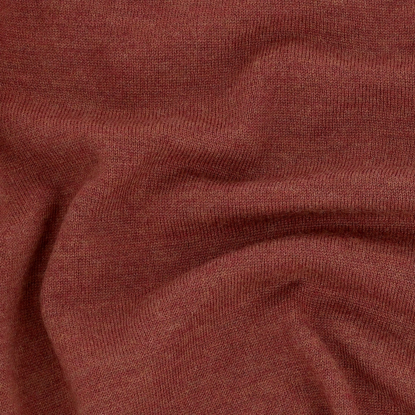 Close-up of the Tom Beckbe York Merino Quarter Zip sweater, showcasing its reddish-brown color and soft texture.