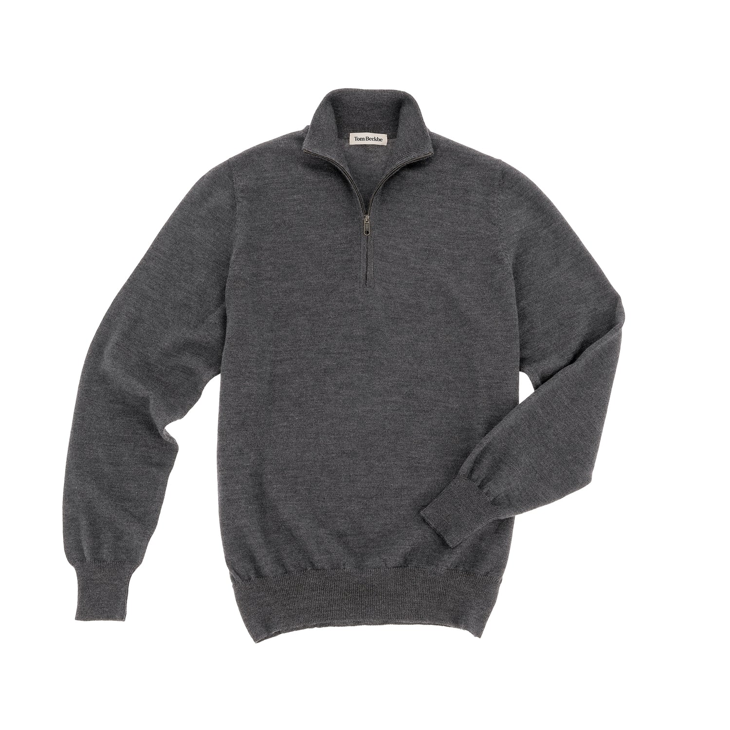The Tom Beckbe York Merino Quarter Zip in dark gray is laid flat on a white background.