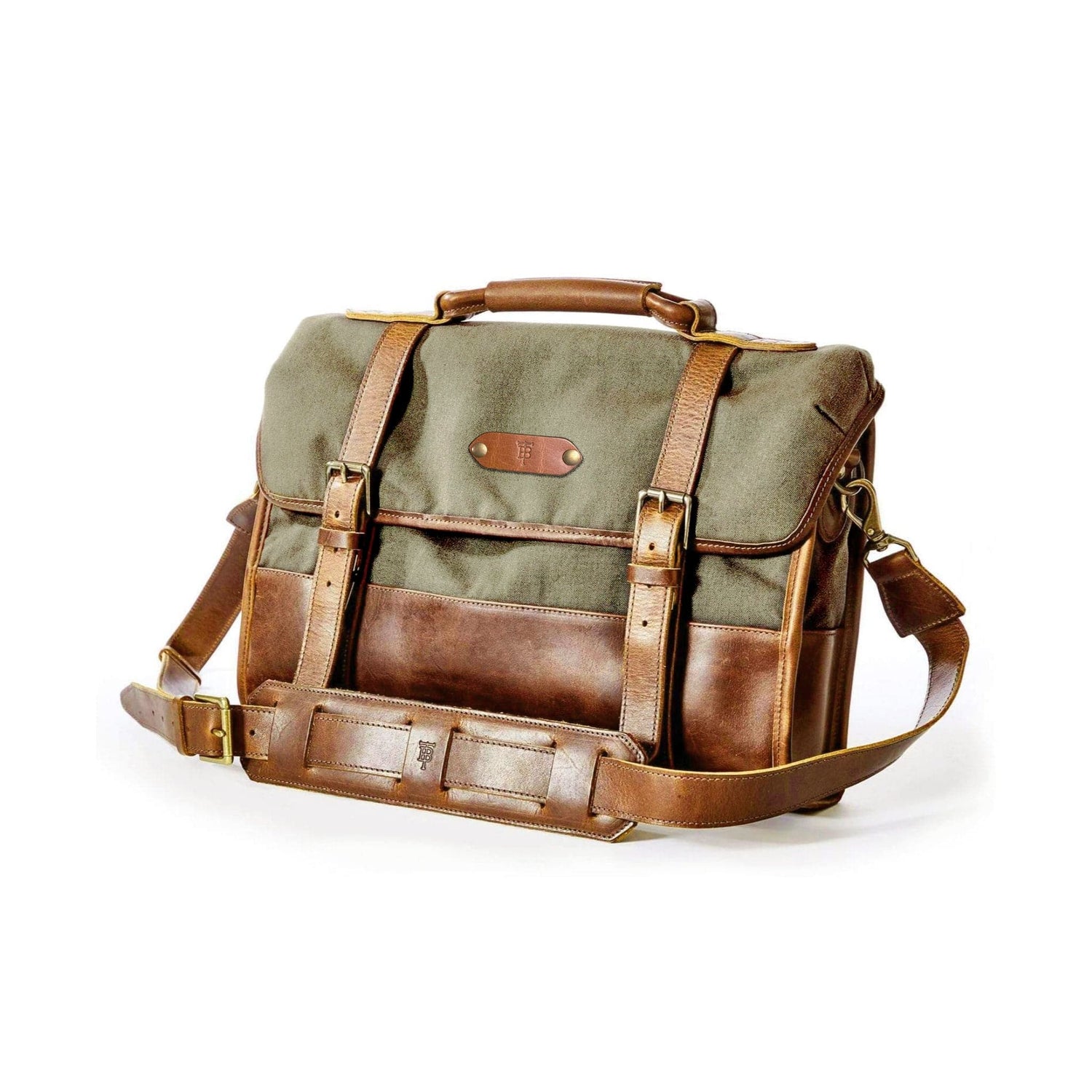 Tom Beckbe Messenger Bag: Green/brown leather with buckle straps, handle, laptop sleeve, adjustable strap.