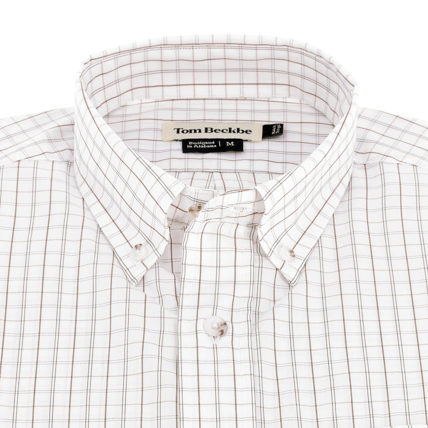 The Tom Beckbe Monroe Poplin Shirt, brown plaid cotton, is neatly folded on a white background.