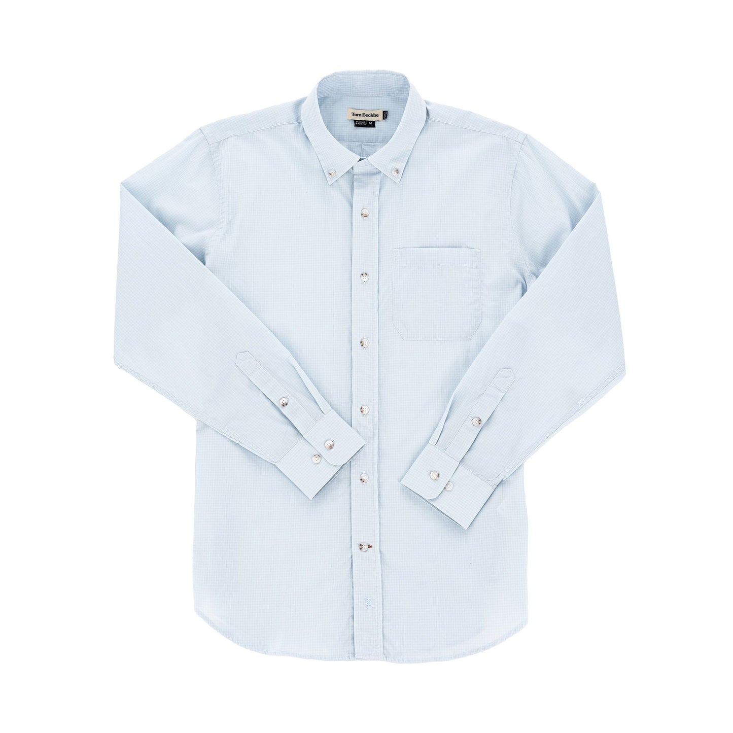 Tom Beckbes Monroe Poplin Shirt, light blue cotton with a chest pocket and long sleeves, slightly wrinkled on white.