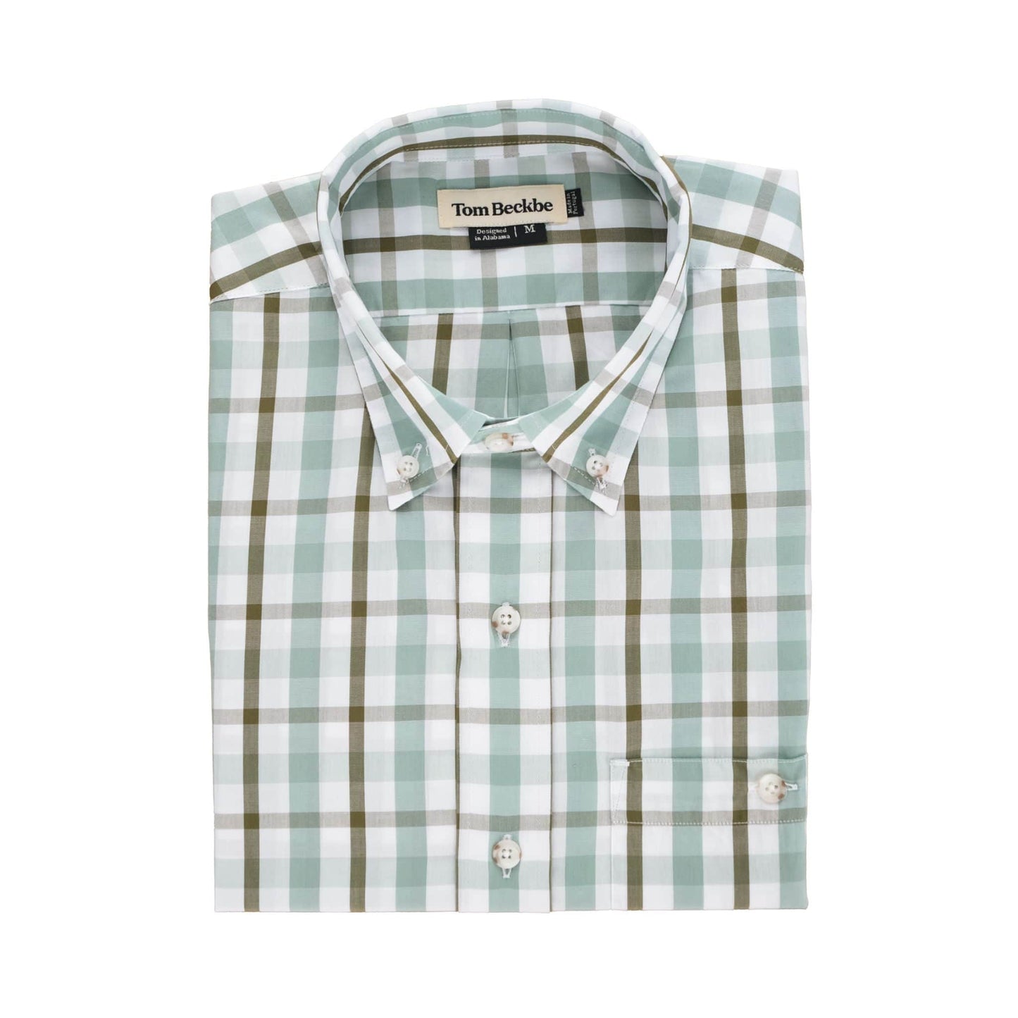 Tom Beckbes Monroe Poplin Shirt: Folded, breathable cotton with green, brown, and white plaid. Collar and brand label visible.