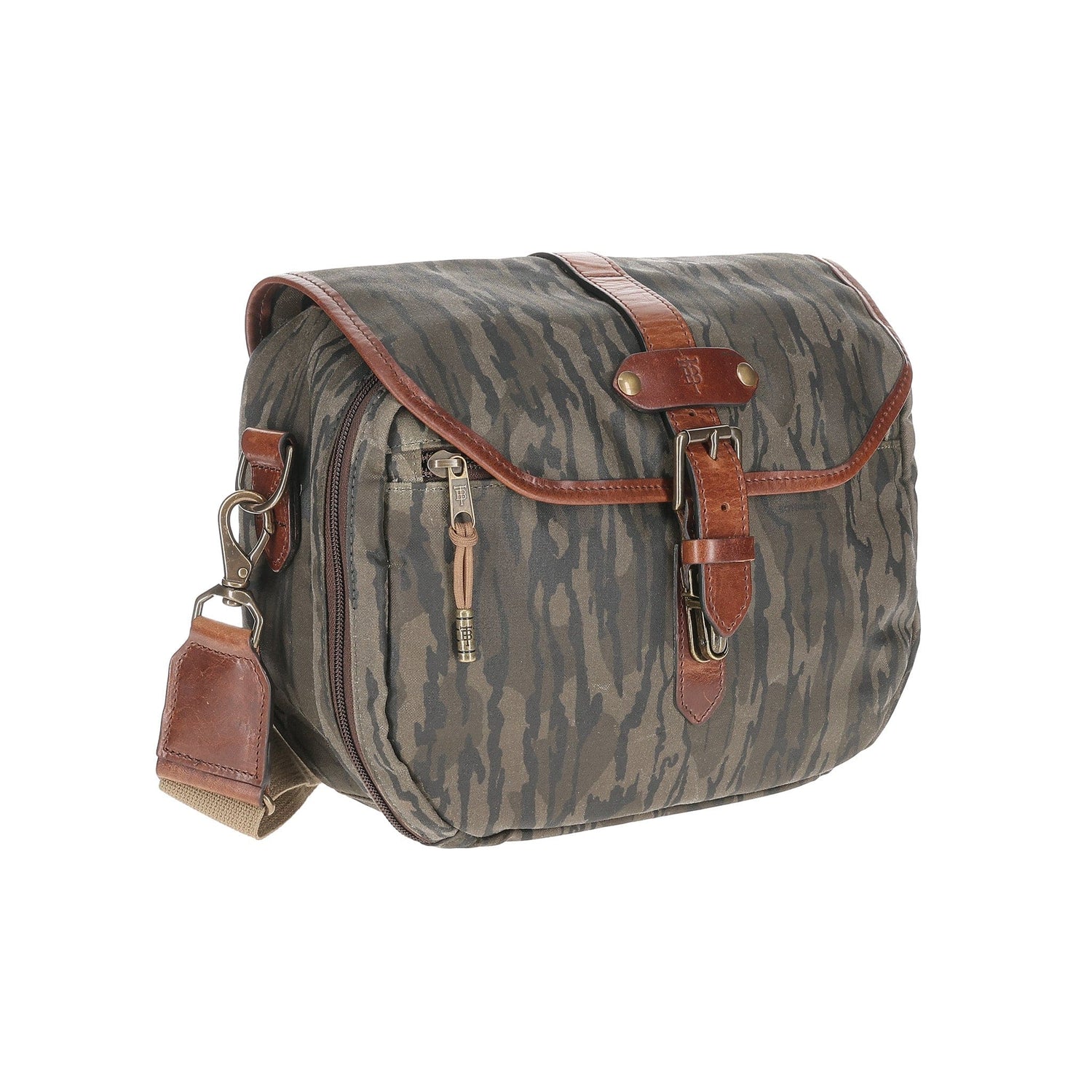 A Tom Beckbe Canvas Blind Bag with leather trim, shoulder strap, and buckle closure in Mossy Oak Original Bottomland.
