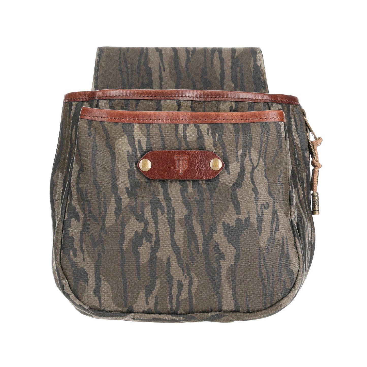 Tom Beckbe Canvas Shell Bag in Mossy Oak Original Bottomland features leather trim and a buttoned front pocket.