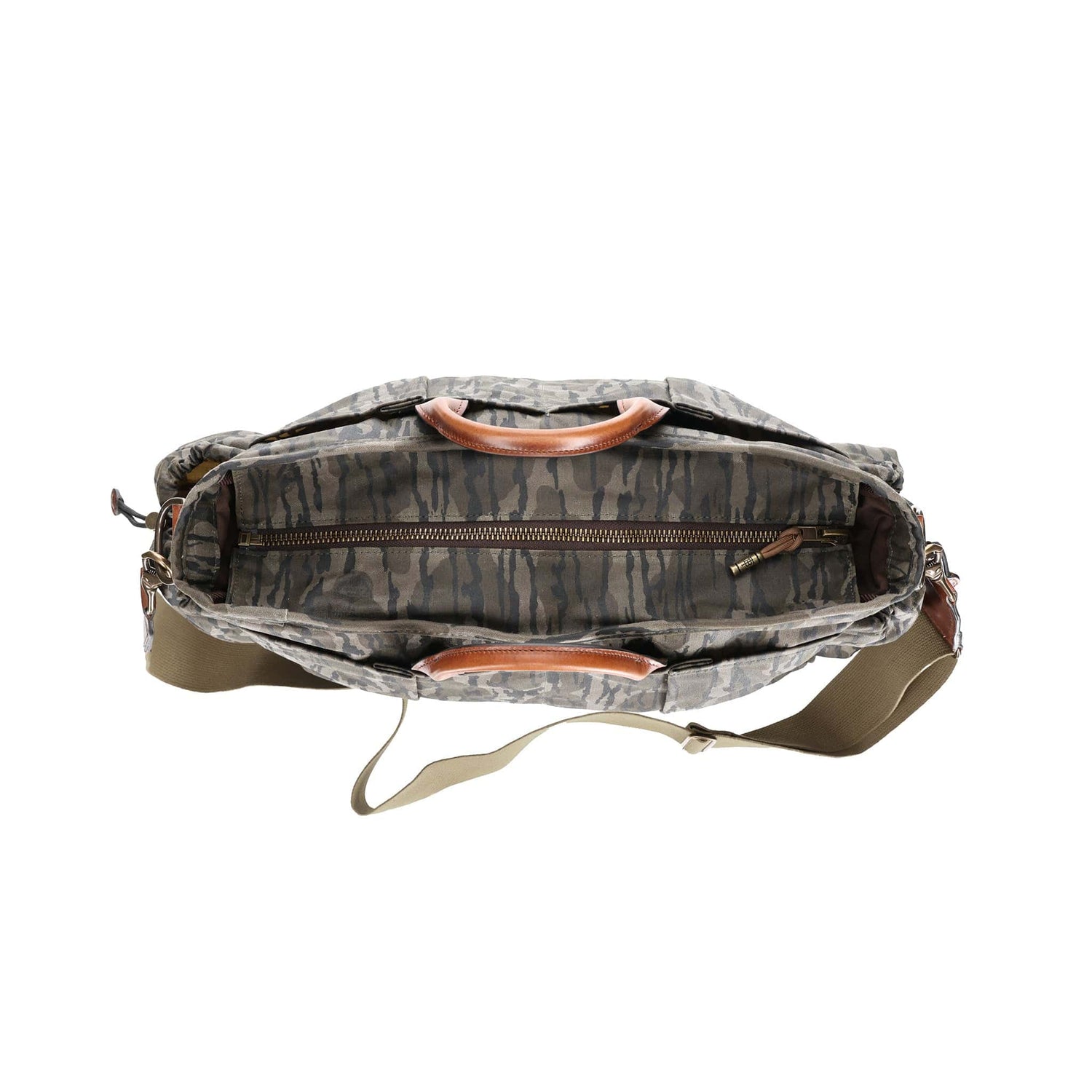 Top view of the Tom Beckbe Canvas Utility Bag in Mossy Oak with leather handles and an interior zippered compartment.