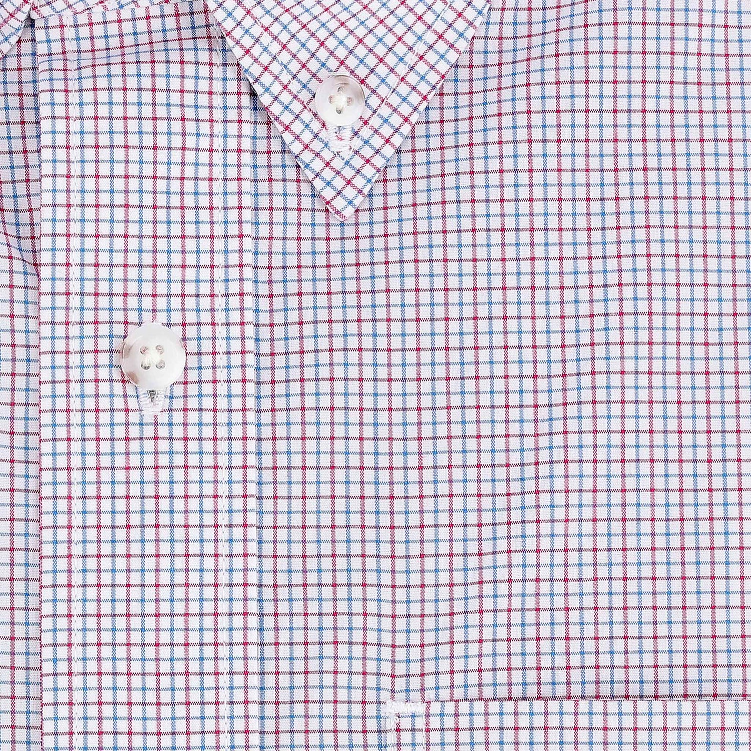 Close-up of Tom Beckbe’s Powell Performance Shirt with red-blue checks, white buttons, and UPF 30+ sun protection.