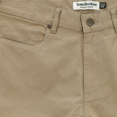 Close-up of Tom Beckbe Reid Straight Leg Cotton Chino Pant in tan with front pocket, belt loop, and button closure.