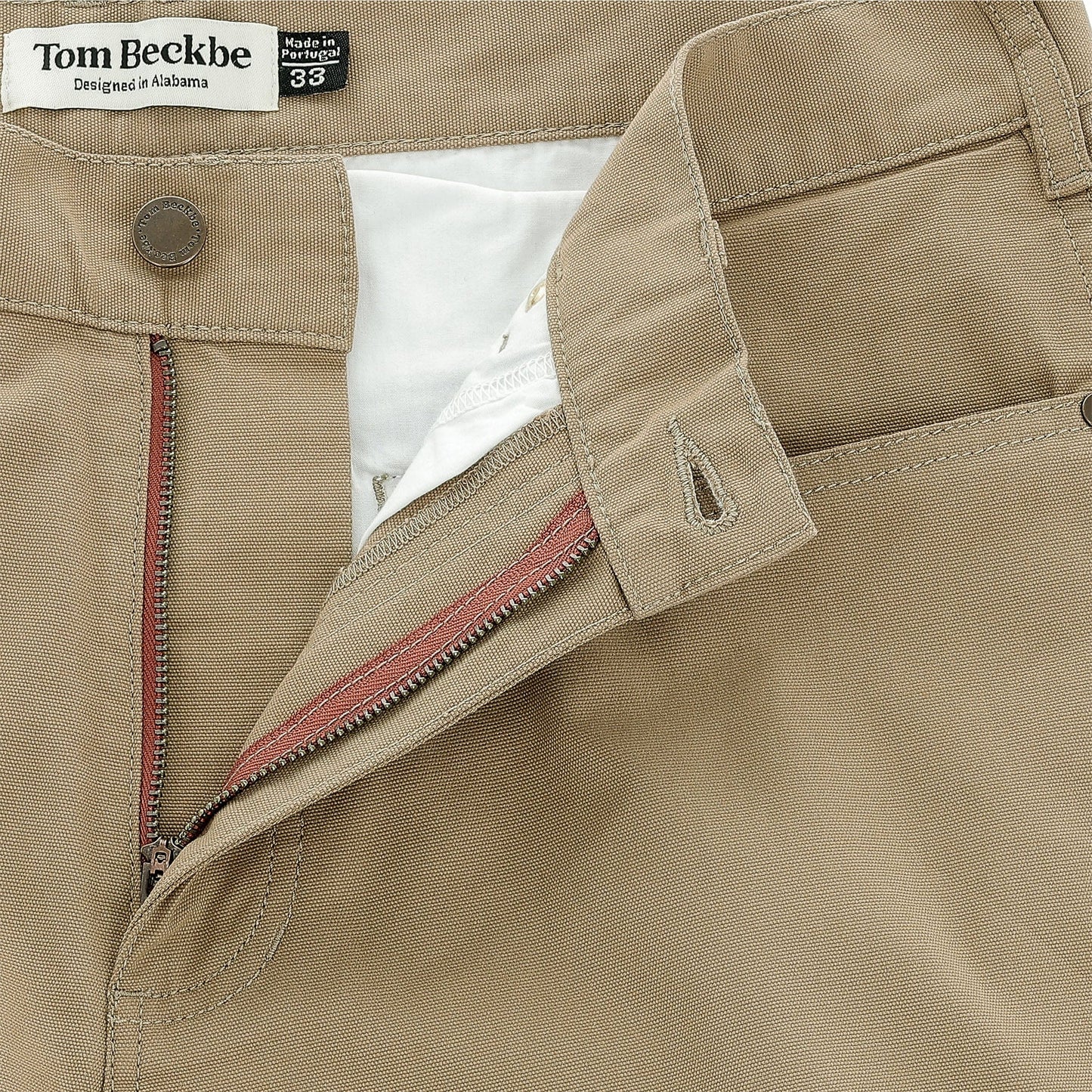 Reid Straight Leg Cotton Chino Pant by Tom Beckbe, shown open to reveal the branded waistband label.