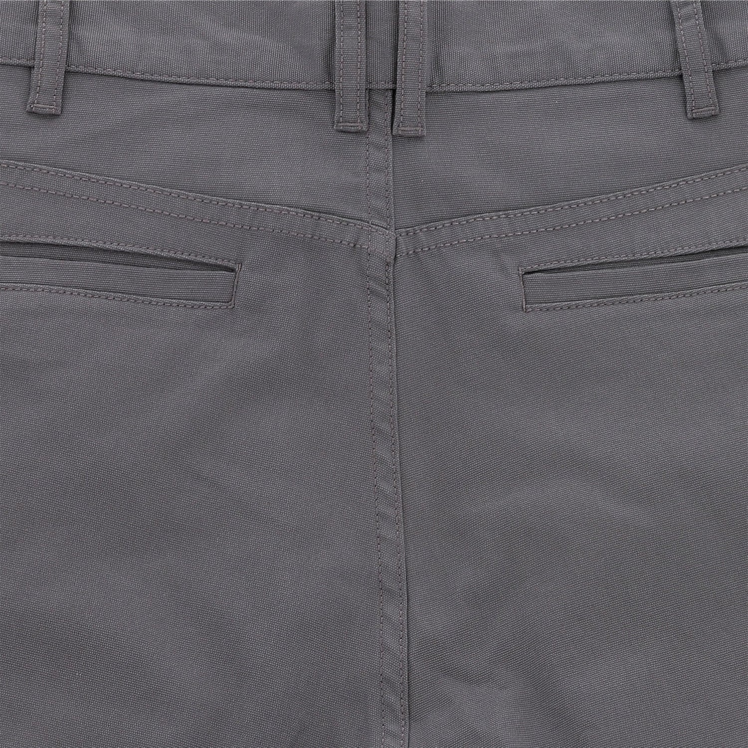 Close-up of Tom Beckbe's Reid Straight Leg Cotton Chino Pant back with belt loops, seam, and two welt pockets.