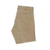 The Tom Beckbe Reid Short is a mid-rise chino with a flat front, back pocket, and brass zip fly on a white background.