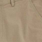 Close-up of Tom Beckbes Reid Short in khaki, highlighting the belt loop, front pocket seam detail, and brass zip fly.