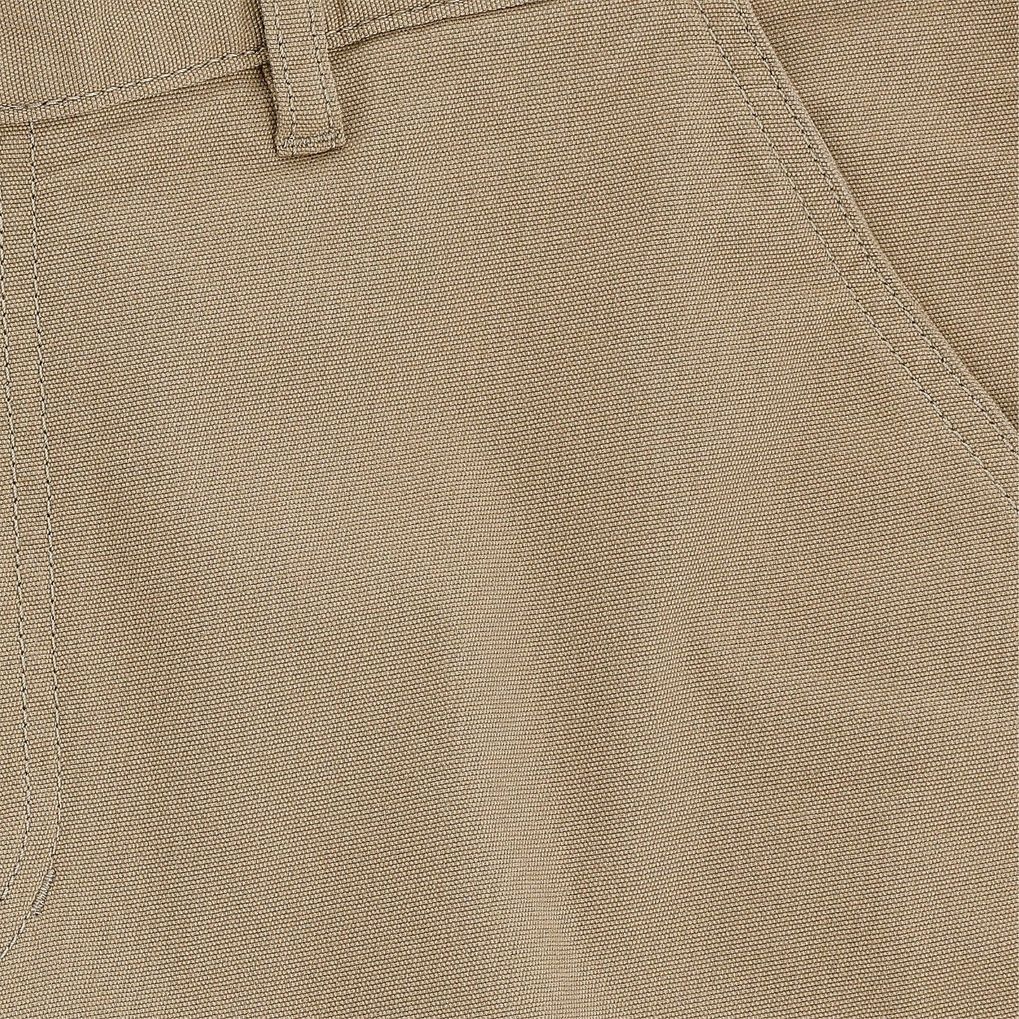 Close-up of Tom Beckbes Reid Short in khaki, highlighting the belt loop, front pocket seam detail, and brass zip fly.