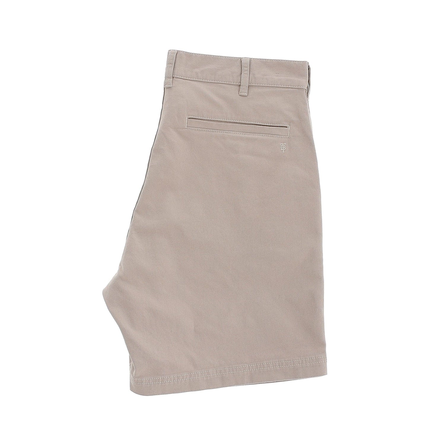 Reid Short by Tom Beckbe: Mid-rise khaki cotton chinos with a back pocket and brass zip fly on a white background.