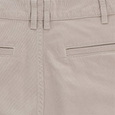 Close-up of Tom Beckbes Reid Short in beige, featuring mid-rise, double belt loops, horizontal pockets, detailed stitching.